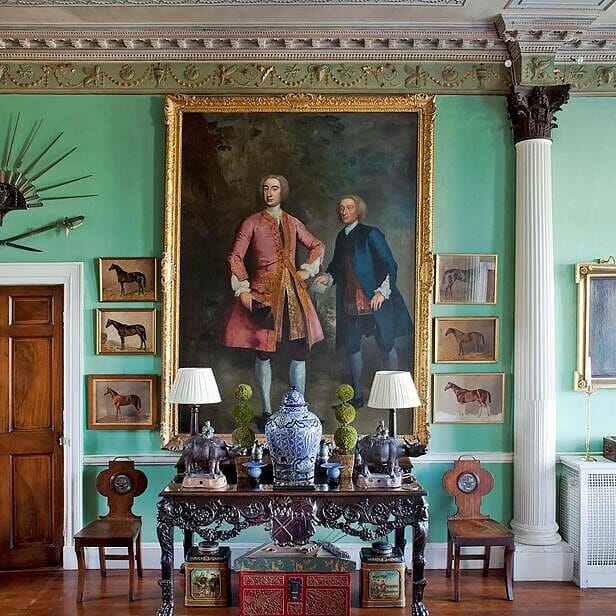 The entrance hall and the enfilade of reception rooms are filled with a unique collection of Irish 18th century mahogany furniture.